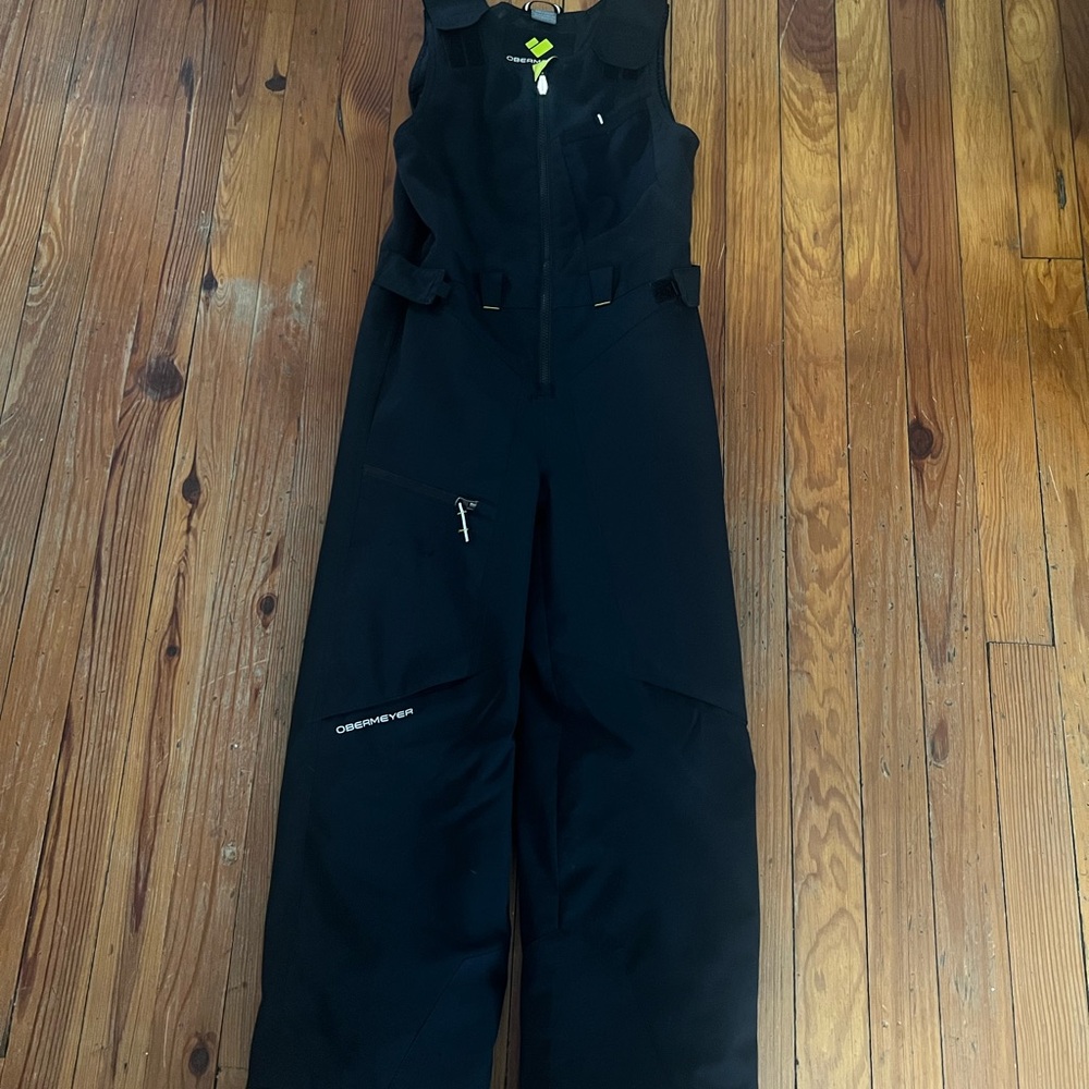 Size 8 boys black obermeyer ski bibs.